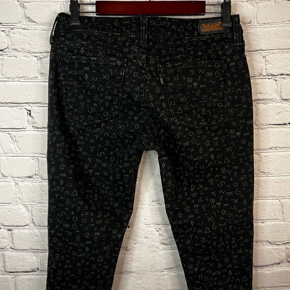 Levi's Legging Fit Skinny Mid Rise Jeans Black Grey Symbols Woman's size 31x30 - Picture 5 of 10
